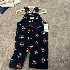 NWT girls Oshkosh corduroy overalls. Navy blue with floral detail. Nine months.